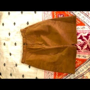 Tan leather mini skirt
